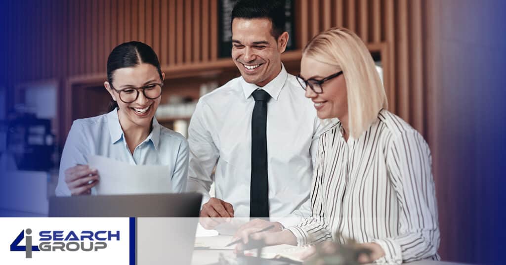Picture of three business people talking
